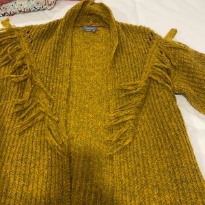 Anthropologie fringe sweater. Kind of a brown abs mustard color with is awesome!